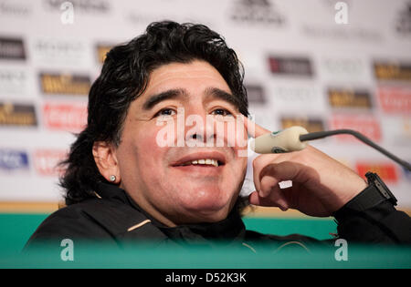 Argentina's head coach Diego Armando Maradona smiles during a press conference after soccer test match Germany vs Argentina at AllianzArena stadium in Munich, Germany, 03 March 2010. Argentina won the match 1-0. Photo: Andreas Gebert Stock Photo