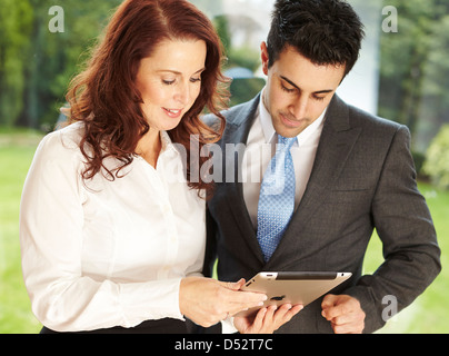 Two work colleagues discussing business Stock Photo