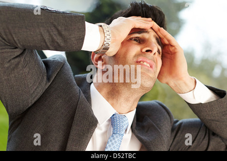 Man stressed out at work Stock Photo