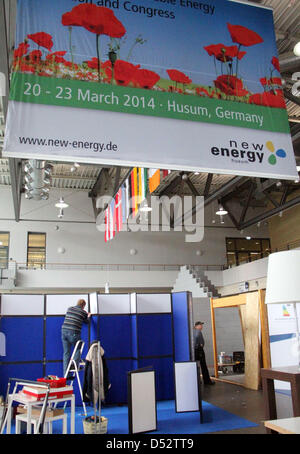 Booths are installed for the New Energy 2013 fair in Husum, Germany, 20 March 2013. More than 300 exhibitors from 14 countries present their products and concepts from all areas of renewable energy and energy efficiency at the fair which is open until 24 March. Photo: Wolfgang Runge Stock Photo