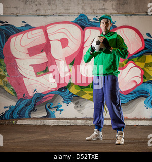 An urban footballer in his native environment Stock Photo