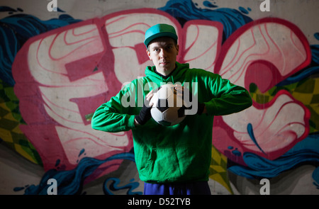 An urban footballer in his native environment Stock Photo