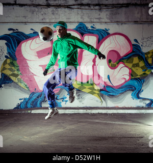 An urban footballer in his native environment Stock Photo