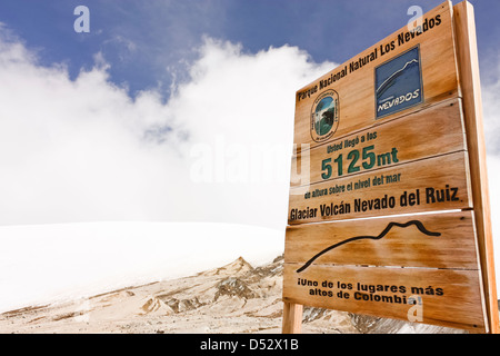 Glacier Volcano Nevado del Ruiz signboard. Due to climate change, the glacier is running. Colombian andes. Stock Photo