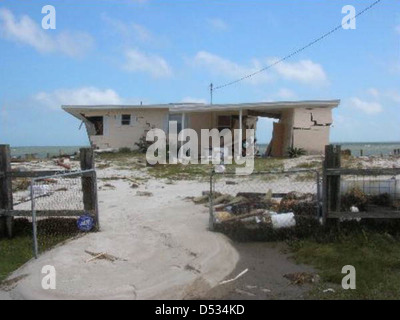 A home in Alligator Point, Florida, severely damaged by Hurricane Dennis in 2005. The storm caused significant destruction to coastal areas along Florida's Gulf Coast. Stock Photo