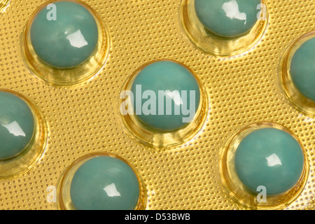 Green pills isolated on white background Stock Photo