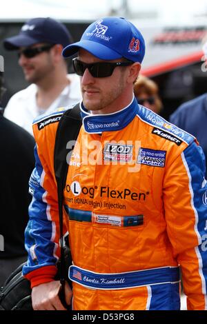 St. Petersburg, Florida, USA. 23rd March 2013. IndyCar series driver Charlie Kimball walks down pit lane before the start of afternoon qualyfing sessions. (Credit Image: Credit:  Luis Santana/Tampa Bay Times/ZUMAPRESS.com/Alamy Live News) Stock Photo