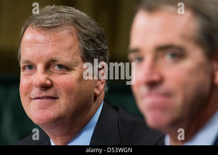 Douglas Parker, chairman and CEO of the US Airways Group, left, and Thomas Horton, chairman of the president and CEO of American Airlines and AMR Corporation, right. Stock Photo