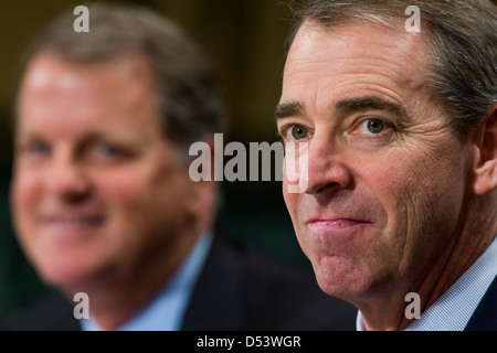 Douglas Parker, chairman and CEO of the US Airways Group, left, and Thomas Horton, chairman of the president and CEO of American Airlines and AMR Corporation, right. Stock Photo