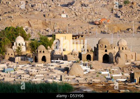 Fatimid cemetery which contains several hundred mud brick Islamic tombs, built between the 8th and 12th centuries. Aswan Egypt. Stock Photo