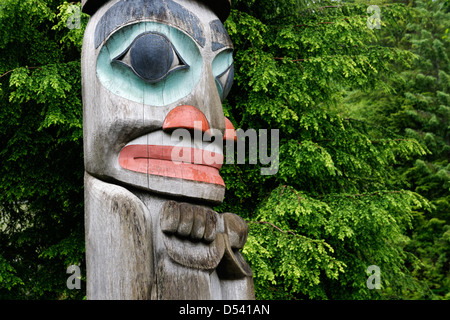 Detail on Raven Stealing the Sun totem pole, downtown Ketchikan, Alaska Stock Photo