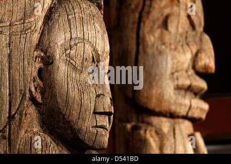 Totem poles inside Totem Heritage Center (Memorial Pole, Haida, left and Mortuary Pole, Tlingit, right), Ketchikan, Alaska Stock Photo