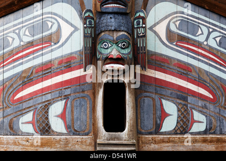 Replica of Clan House with entrance pole, Totem Bight State Historical Park, Ketchikan, Alaska Stock Photo