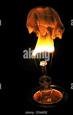 Broken light bulb explosion Stock Photo