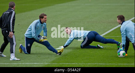 Nuremberg Germany. 24th March, 2013. Goalkeeper coach Andreas Koepke (l-r) and goalkeepers Rene Adler, Manuel Neuer and Ron-Robert Zieler of Germany attend a training session prior to the FIFA World Cup 2014 qualification group C soccer match between Germany and Kazakhstan in Nuremberg Germany, 24 March 2013. The match is played on 26 March 2013 in Nuremberg. Foto: Daniel Karmann/dpa +++(c) dpa - Bildfunk+++ Stock Photo