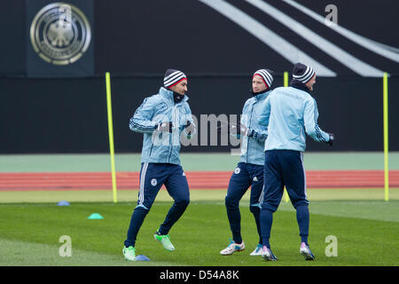 Nuremberg Germany. 24th March, 2013. Ilkay Guendogan (l-r), Marco Reus and Andre Schuerrle of Germany attend a training session prior to the FIFA World Cup 2014 qualification group C soccer match between Germany and Kazakhstan in Nuremberg Germany, 24 March 2013. The match is played on 26 March 2013 in Nuremberg. Foto: Daniel Karmann/dpa +++(c) dpa - Bildfunk+++ Stock Photo