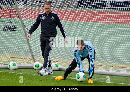 Nuremberg Germany. 24th March, 2013. Goalkeeper Ron-Robert Zieler (R) and goalie coach Andreas Koepke of Germany attend a training session prior to the FIFA World Cup 2014 qualification group C soccer match between Germany and Kazakhstan in Nuremberg Germany, 24 March 2013. The match is played on 26 March 2013 in Nuremberg. Foto: Daniel Karmann/dpa +++(c) dpa - Bildfunk+++ Stock Photo