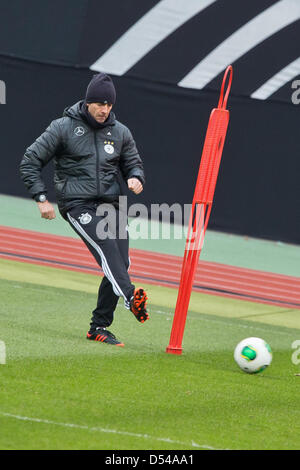 Nuremberg Germany. 24th March, 2013. Coach Joachim Loew of Germany attends a training session prior to the FIFA World Cup 2014 qualification group C soccer match between Germany and Kazakhstan in Nuremberg Germany, 24 March 2013. The match is played on 26 March 2013 in Nuremberg. Foto: Daniel Karmann/dpa Stock Photo