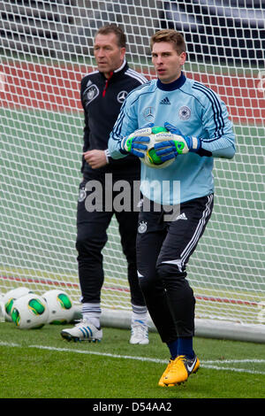 Nuremberg Germany. 24th March, 2013. Goalkeeper Ron-Robert Zieler (R) and goalie coach Andreas Koepke of Germany attend a training session prior to the FIFA World Cup 2014 qualification group C soccer match between Germany and Kazakhstan in Nuremberg Germany, 24 March 2013. The match is played on 26 March 2013 in Nuremberg. Foto: Daniel Karmann/dpa +++(c) dpa - Bildfunk+++ Stock Photo