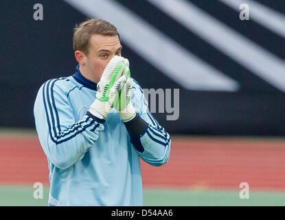 Nuremberg Germany. 24th March, 2013. Goalkeeper Manuel Neuer of Germany attends a training session prior to the FIFA World Cup 2014 qualification group C soccer match between Germany and Kazakhstan in Nuremberg Germany, 24 March 2013. The match is played on 26 March 2013 in Nuremberg. Foto: Daniel Karmann/dpa +++(c) dpa - Bildfunk+++ Stock Photo
