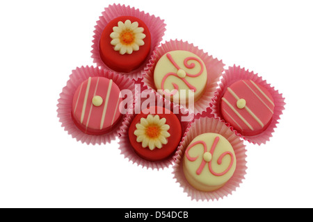 Selection of marzipan petit fours isolated on white Stock Photo