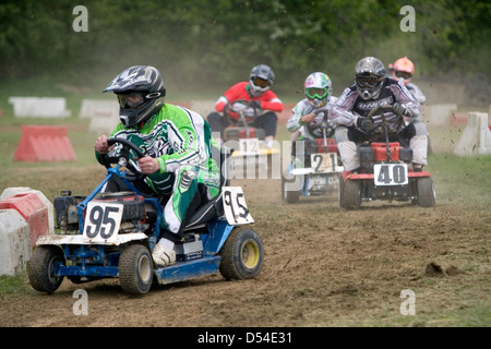 Lawnmower racing, Billingshurst, West Sussex, UK.  Pictured is a group 3 race underway. Stock Photo