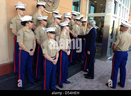 US Secretary of State John Kerry speaks to the Marine guard at the US Embassy March 24, 2013 in Baghdad, Iraq. Stock Photo