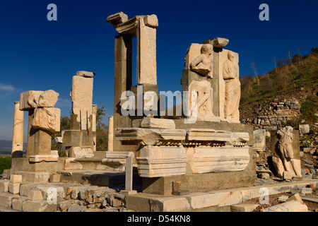 Stone relief Memmius Monument at top of Curetes street beside the State Agora in ruins of ancient Ephesus Turkey Stock Photo