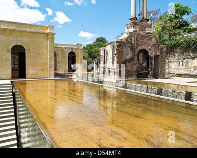 subtle descending levels of reflecting pools & water wall at stairs leading to entrance of Arts Center San Agustin Etla Mexico Stock Photo