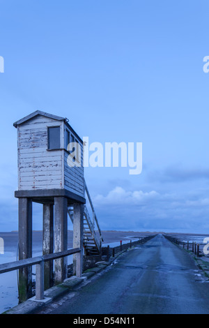 Lindisfarne causeway refuge box in evening light, Isle of Lindisfarne, Northumberland, England, UK Stock Photo