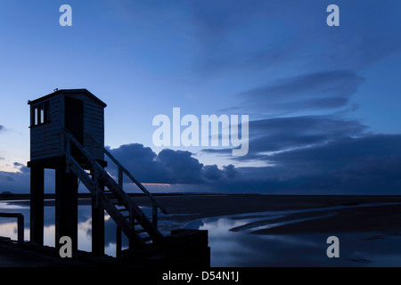 Lindisfarne causeway refuge box in evening light, Isle of Lindisfarne, Northumberland, England, UK Stock Photo