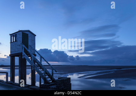 Lindisfarne causeway refuge box in evening light, Isle of Lindisfarne, Northumberland, England, UK Stock Photo