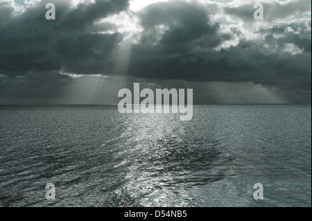 Prora, Germany, sunbeams shining through a thick cloud cover over the Baltic Sea Stock Photo