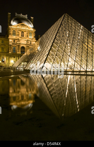 The Louvre Pyramid at Night, Paris, France Stock Photo