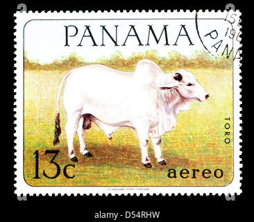 Postage stamp from Panama depicting a cow in a field Stock Photo