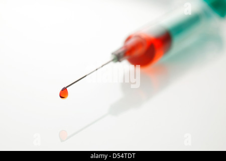 Freiburg, Germany, syringe with blood drop Stock Photo