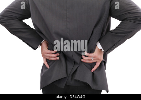 Young businessman having some lower back pain Stock Photo