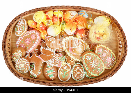 collection of easter gingerbreads and painted eggs isolated on white Stock Photo