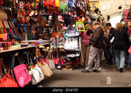 Leather goods and other souvenirs in Loggia del Mercato Nuovo in Florence Italy Stock Photo