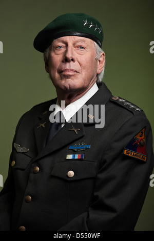 US military general wearing beret. Salutation. Studio portrait Stock ...