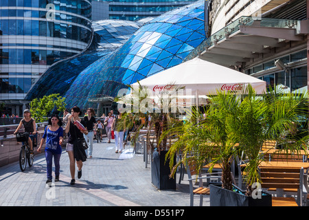 Pedestrian walkway leading to the Złote Tarasy (Golden Terraces) shopping mall in central Warsaw, Poland. Stock Photo