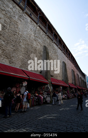 Market stalls under the arches of the old fortified city walls in Muurivahe, Tallinn Old Town, Tallinn, Estonia, Baltic States Stock Photo