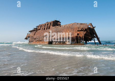 Shipwreck stranded on beach Stock Photo