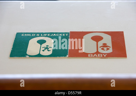 childs and baby lifejacket storage on passenger deck of ferry cruise ship norway europe Stock Photo
