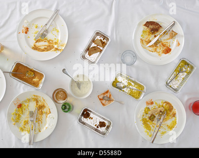 Overhead view of dirty dishes on table Stock Photo
