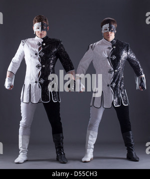 two young guys in theater costumes Stock Photo - Alamy