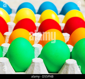 Different colorful Easter eggs, happy holiday, chicken egg, traditional Christian eastertime painted eggs, rainbow colors Stock Photo