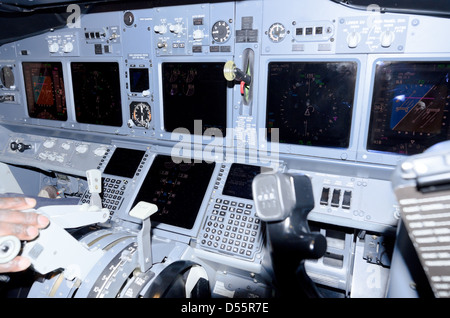 Calgary, Canada - October 6th, 2012: Cockpit of Boeing 737-800 flight simulator powered up and waiting at gate Stock Photo