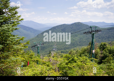 Baggage cart/gondola skyride at Loon Mountain Resort, NH - with mountain landscape as a background Stock Photo