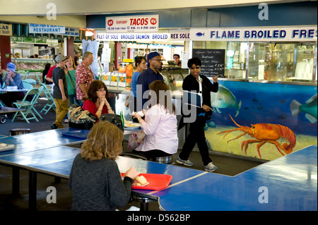 People dining at the historic Farmers Market in Los Angeles, CA Stock Photo